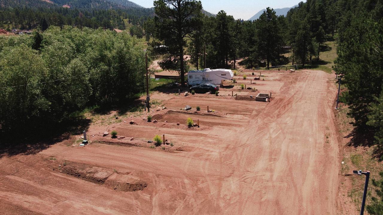 Aerial view of RV pads and campground roads tucked into pines